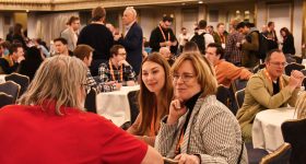 First-time attendees gather at the New Member Welcome to kick-start engagement and learning at the AMUG conference. Photo via AMUG.