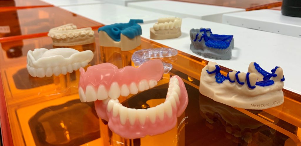 NextDent 5100 addresses multiple applications combined with the wide range of validated NextDent materials. Photo via 3D Systems.